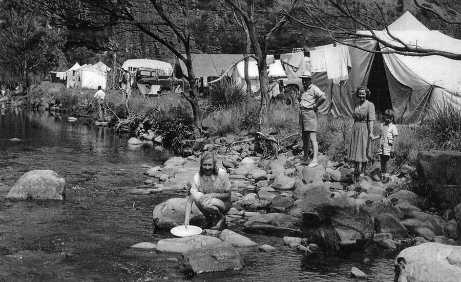 The Plunkett family camped by the river. Taken by The Melbourne "Age" in 1951