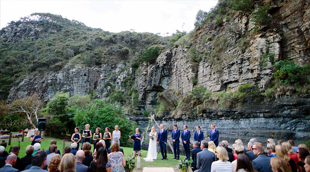 Wedding day with cliff escarpment background