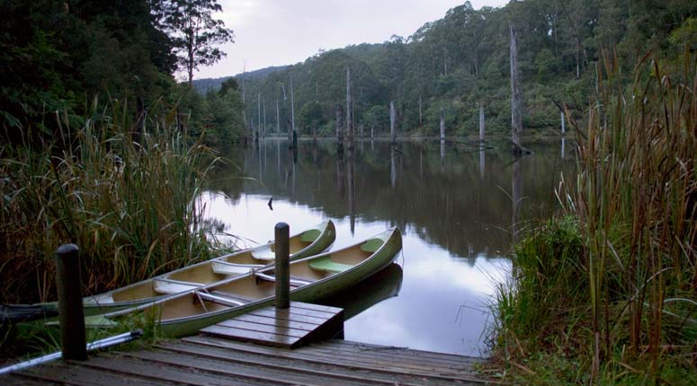 Canoe on rivers edge